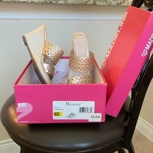 Gorgeous champagne color wedge slides.  Used once. Slight discoloration on wedge